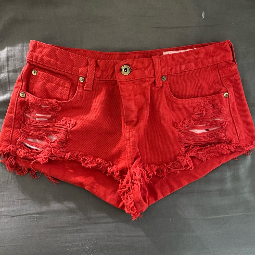 Red Pistola distressed shorts